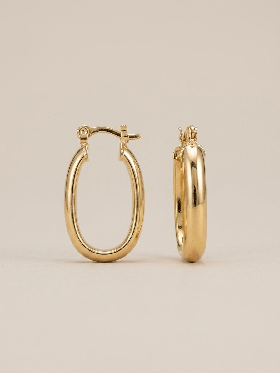 Brinco Argola Oval Meia Cana Banhada a Ouro